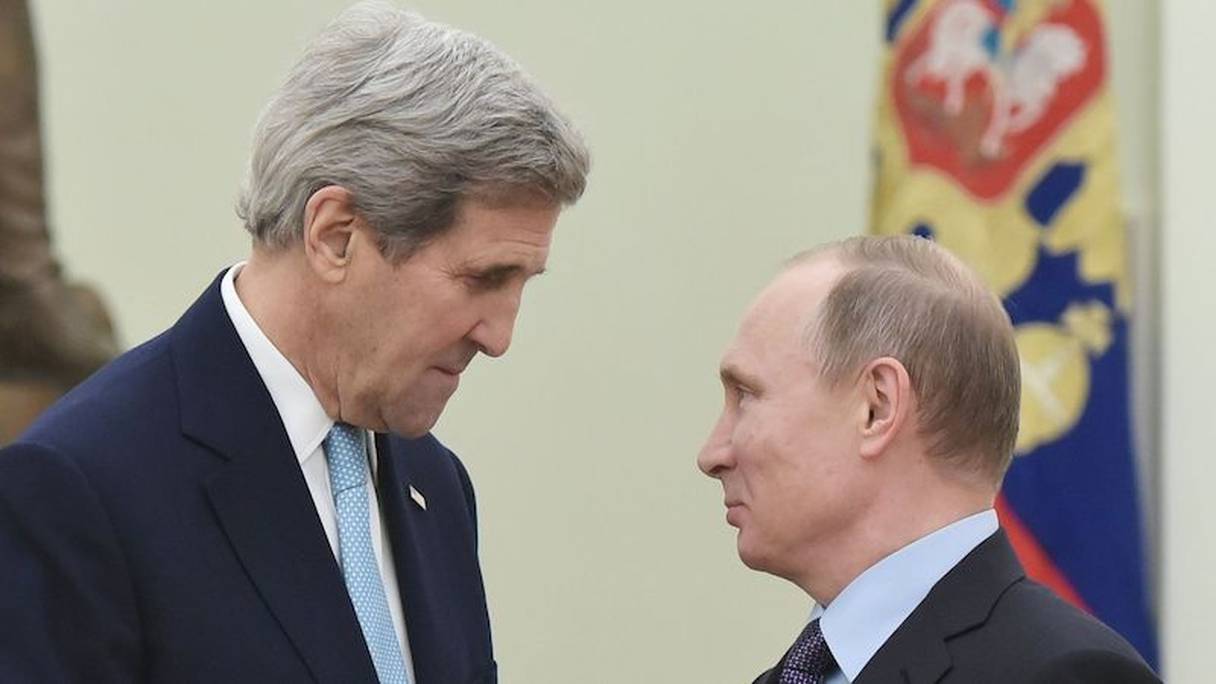 Le secrétaire d'Etat américain John Kerry et le président russe Vladimir Poutine.
