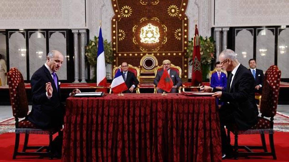 Cérémonie de siganture de l'accord de formation des imams français, par les ministres Taoufik et Fabius, sous la présidence du roi Mohammed VI et le président Hollande.
