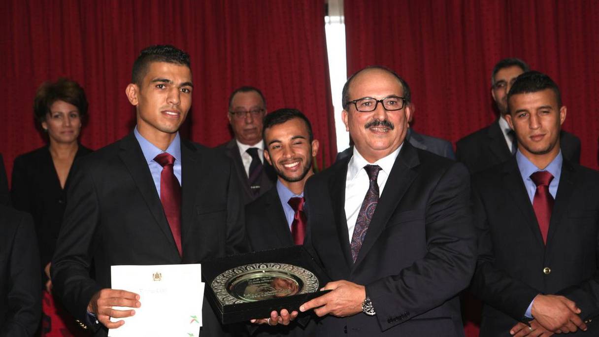 Mohamed Rabii et Lahcen Sekkouri, ministre de la Jeunesse et des sports.
